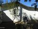 The backyard features desert landscaping, white brick, and an A/C unit at 1922 N 21St Pl, Phoenix, AZ 85006
