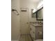 Bathroom offering a granite countertop vanity, framed mirror, and modern fixtures at 1922 N 21St Pl, Phoenix, AZ 85006