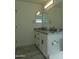Elegant bathroom features a double sink vanity with a granite countertop and modern fixtures at 1922 N 21St Pl, Phoenix, AZ 85006