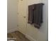 Bathroom features a towel rack with stacked towels and a door at 1922 N 21St Pl, Phoenix, AZ 85006