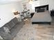 Bedroom with a bed, living area, dining table, and ceiling fan at 1922 N 21St Pl, Phoenix, AZ 85006