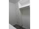 Bright closet features a built-in shelving unit with a hanging rod and ample vertical storage space at 1922 N 21St Pl, Phoenix, AZ 85006