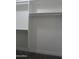 Walk-in closet featuring built-in shelving and ample storage space at 1922 N 21St Pl, Phoenix, AZ 85006