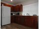 Kitchen featuring updated cabinets, appliances, countertop, and a large window at 1922 N 21St Pl, Phoenix, AZ 85006