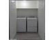 Laundry room features a modern, matching washer and dryer in the utility closet at 1922 N 21St Pl, Phoenix, AZ 85006