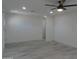 This light and airy living room features a ceiling fan and wood-look floors at 1922 N 21St Pl, Phoenix, AZ 85006