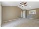 Spacious living room with a ceiling fan, neutral paint and plush carpeting for a cozy feel at 200 E Southern Ave # 368, Tempe, AZ 85282