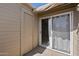 Private patio featuring siding walls, a sliding glass door, and storage at 200 E Southern Ave # 368, Tempe, AZ 85282