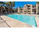 Community pool surrounded by lush landscaping and seating, perfect for outdoor relaxation at 200 E Southern Ave # 368, Tempe, AZ 85282