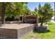 Elegant entrance sign for Chesapeake Condominiums, set amidst lush landscaping and mature palm trees at 200 E Southern Ave # 368, Tempe, AZ 85282