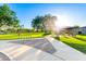 Tranquil community park featuring a shaded picnic area, green lawns, and scenic walking paths at 21538 E Alyssa Ct, Queen Creek, AZ 85142