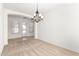 Bright dining area with access to the backyard through a glass door at 21538 E Alyssa Ct, Queen Creek, AZ 85142