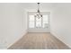 Formal dining area featuring a chandelier and bright natural light at 21538 E Alyssa Ct, Queen Creek, AZ 85142