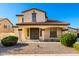 Charming two-story home with a welcoming front porch and desert landscaping at 21538 E Alyssa Ct, Queen Creek, AZ 85142