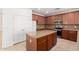Well-appointed kitchen with a large island, pantry and stainless steel appliances at 21538 E Alyssa Ct, Queen Creek, AZ 85142