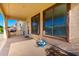 Covered patio with built-in grill area and view of the manicured backyard at 21538 E Alyssa Ct, Queen Creek, AZ 85142