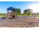 Community playground provides a safe and engaging environment for children to play and socialize at 21538 E Alyssa Ct, Queen Creek, AZ 85142