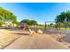 Well-equipped playground with diverse play structures for promotes active and imaginative play at 21538 E Alyssa Ct, Queen Creek, AZ 85142