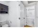 Bright bathroom with a vanity cabinet and patterned tile floor at 2336 E Flower St, Phoenix, AZ 85016