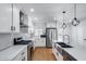 Bright kitchen boasts stainless appliances, quartz countertops, and lots of cabinet space at 2336 E Flower St, Phoenix, AZ 85016