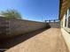 The spacious backyard features a block fence, and landscaping opportunities at 24146 N 162Nd Ln, Surprise, AZ 85387