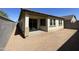 Backyard with covered patio, block fence and landscaping opportunities at 24146 N 162Nd Ln, Surprise, AZ 85387