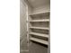 Closet with shelves and natural light at 24146 N 162Nd Ln, Surprise, AZ 85387