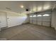 Spacious two-car garage with door to interior at 24146 N 162Nd Ln, Surprise, AZ 85387
