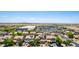 A high angle view of a neighborhood with homes and local shopping center at 283 W Tahiti Dr, Casa Grande, AZ 85122
