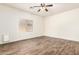 Bedroom with a window, ceiling fan, and neutral paint at 283 W Tahiti Dr, Casa Grande, AZ 85122
