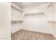 Spacious walk-in closet with ample shelving and rod space for organized storage at 283 W Tahiti Dr, Casa Grande, AZ 85122