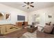 Spacious game room with a pool table, cozy seating, and stylish TV console at 283 W Tahiti Dr, Casa Grande, AZ 85122