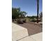 Well-maintained landscaping featuring various trees, shrubs and flowering plants in the community at 283 W Tahiti Dr, Casa Grande, AZ 85122