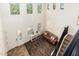 Bright living area with high ceilings, ample windows, and wood-look floors at 283 W Tahiti Dr, Casa Grande, AZ 85122