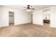 The main bedroom offers a ceiling fan, and ensuite bath at 283 W Tahiti Dr, Casa Grande, AZ 85122