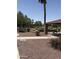 Community pavilion with stone pillars, picnic tables, and a well-maintained landscape at 283 W Tahiti Dr, Casa Grande, AZ 85122