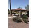 Community pavilion featuring brick columns and picnic tables for outdoor gatherings at 283 W Tahiti Dr, Casa Grande, AZ 85122