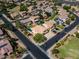 Aerial neighborhood shot featuring mature trees, grassy areas and neatly kept lawns enhancing curb appeal at 2880 E Nunneley Rd, Gilbert, AZ 85296
