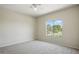 Bright bedroom with large window overlooking greenery, creating a serene retreat at 2880 E Nunneley Rd, Gilbert, AZ 85296