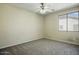 Neutral bedroom with carpet and window, a blank slate ready for personalization at 2880 E Nunneley Rd, Gilbert, AZ 85296