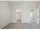 Neutral bedroom featuring access to the en suite and closet with plush carpeting at 2880 E Nunneley Rd, Gilbert, AZ 85296