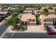 Charming home with a well-manicured lawn, mature trees, and a convenient two-car garage at 2880 E Nunneley Rd, Gilbert, AZ 85296