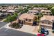 Beautiful home with a spacious driveway, mature trees, and a meticulously maintained front yard at 2880 E Nunneley Rd, Gilbert, AZ 85296
