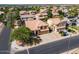 Lovely curb view of this home showcasing mature landscaping, spacious driveway, and manicured front yard at 2880 E Nunneley Rd, Gilbert, AZ 85296