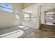Bright living room with vaulted ceiling and stairway access at 2880 E Nunneley Rd, Gilbert, AZ 85296