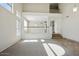 Bright living room featuring vaulted ceilings and stairway access at 2880 E Nunneley Rd, Gilbert, AZ 85296