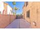 Wide side yard featuring block wall, mature landscaping, and gated access at 2880 E Nunneley Rd, Gilbert, AZ 85296