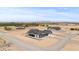 Aerial view of this newly constructed home and the surrounding farmland at 300 S Charleston Ct, Casa Grande, AZ 85194