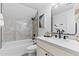 Contemporary bathroom features a sleek vanity, tiled shower, and modern fixtures at 300 S Charleston Ct, Casa Grande, AZ 85194