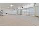 Spacious two-car garage with white doors and modern lighting fixtures at 300 S Charleston Ct, Casa Grande, AZ 85194